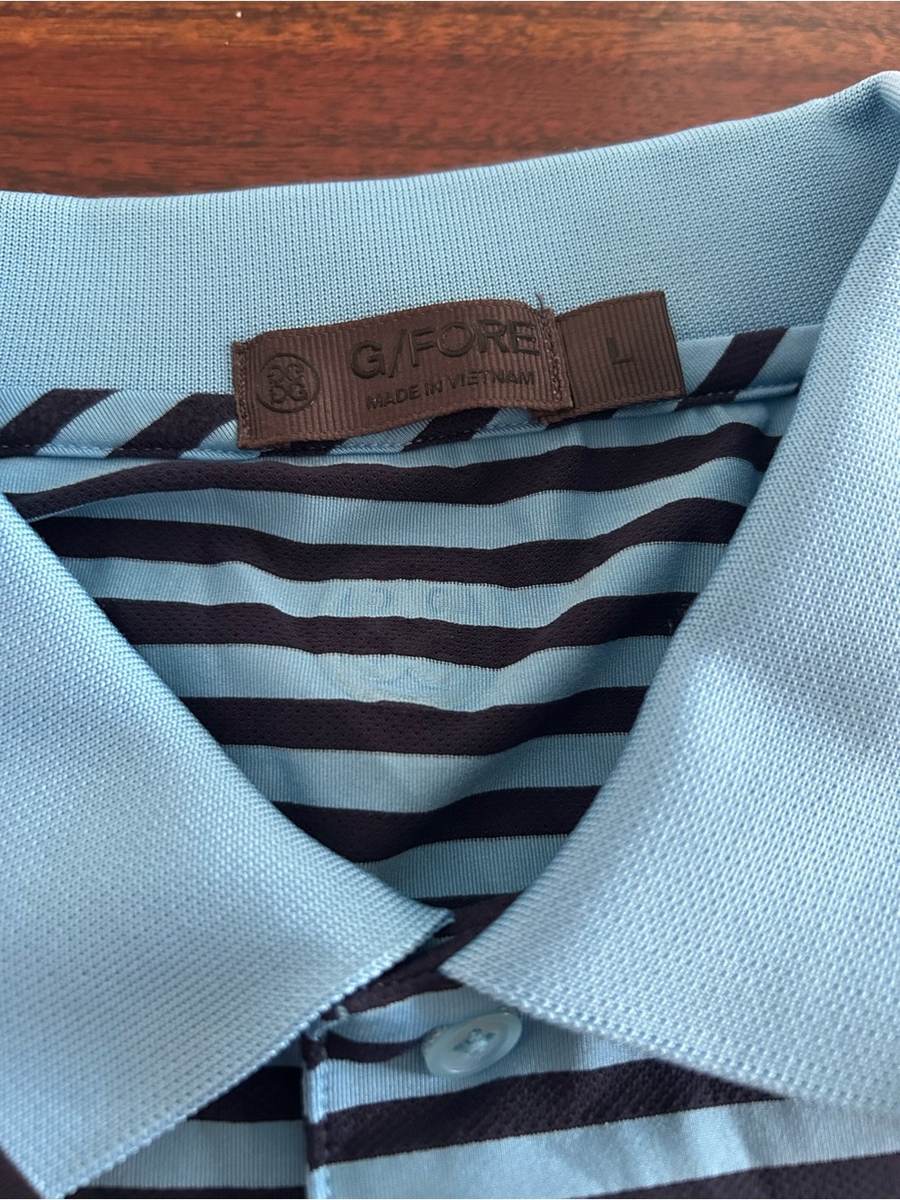 G/FORE Light Blue Polo with Navy Horizontal Stripes